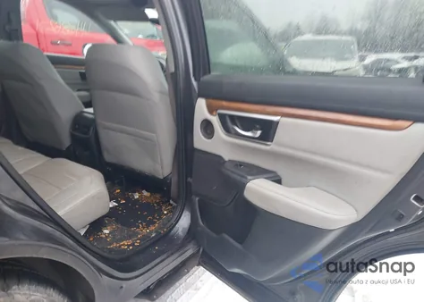 2019 Honda Cr-V Touring z USA, uszkodzony, nr VIN 7FARW1H90KE013970